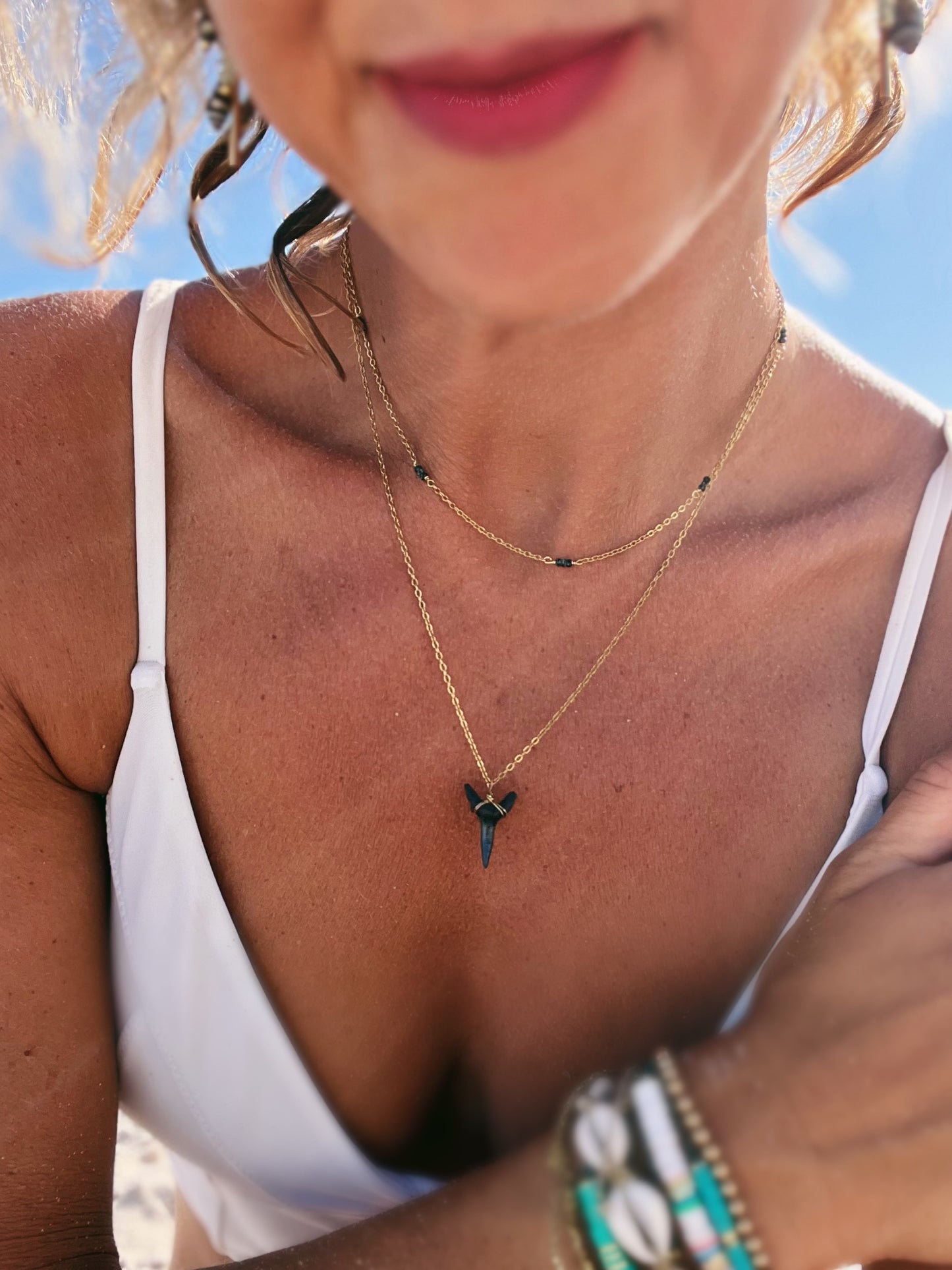 Fossilized shark tooth necklace