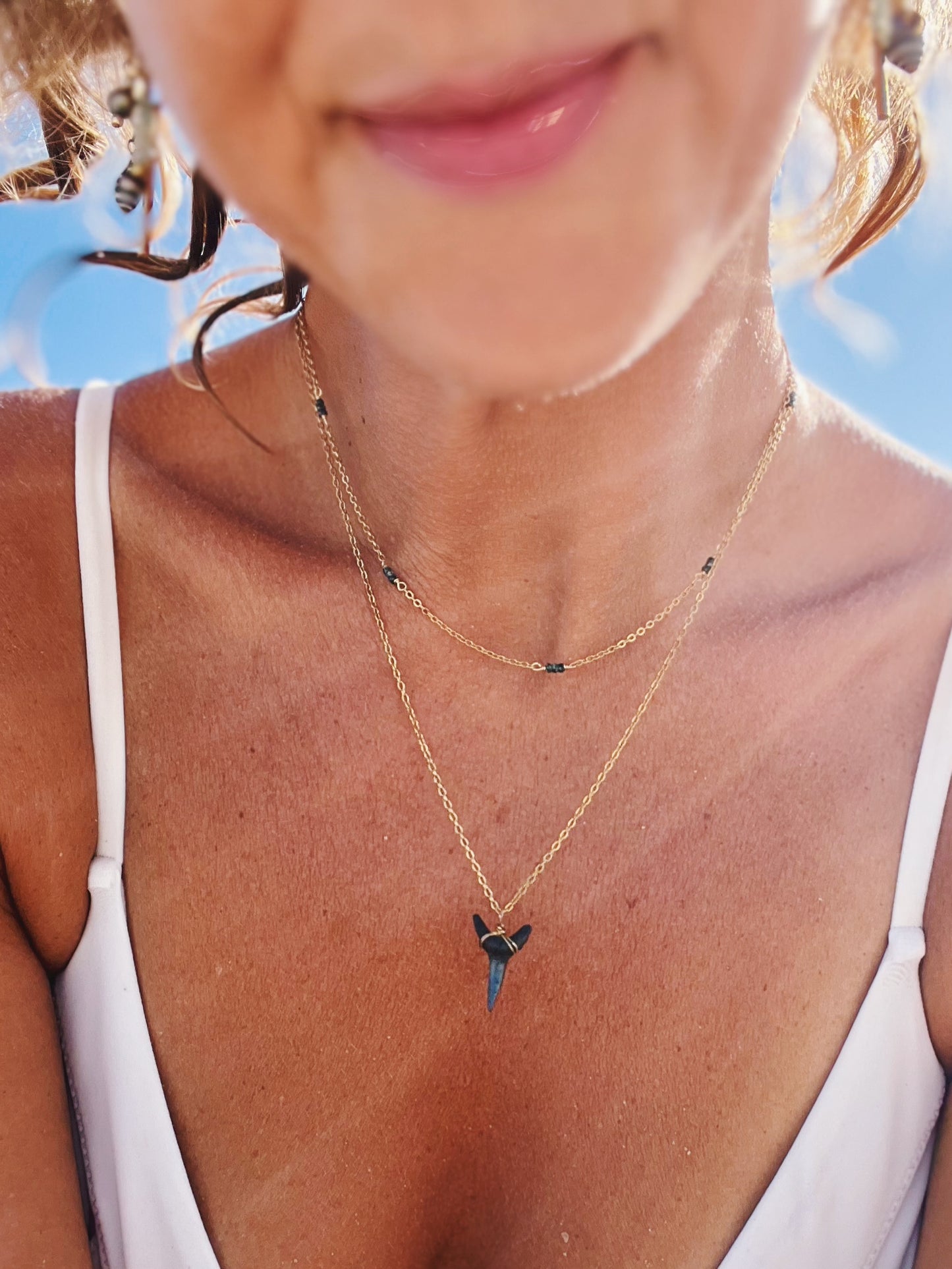 Fossilized shark tooth necklace