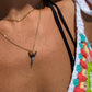 Fossilized shark tooth necklace